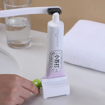 Ленивый ручной соковыжималка для зубной пасты Очищающее средство для лица Образец крема для рук Пресс для зубной пасты Соковыжималка для ванной комнаты